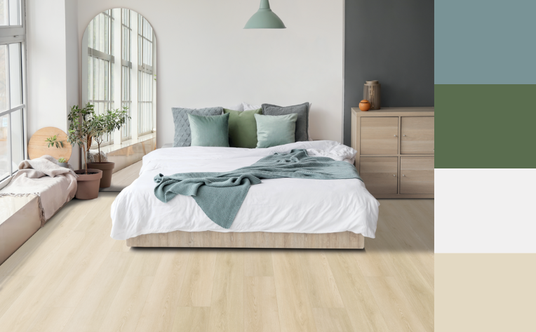 luxury vinyl plank flooring in bedroom with a cohesive color palette
